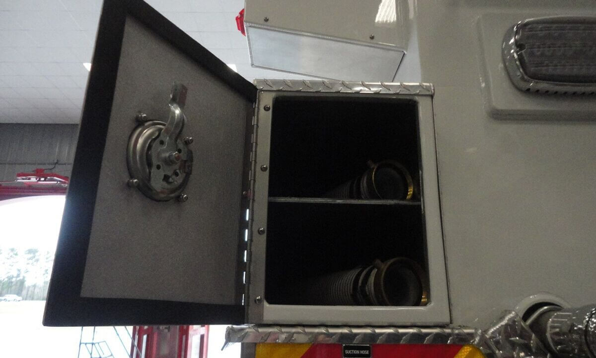 Foam suction hose storage compartments