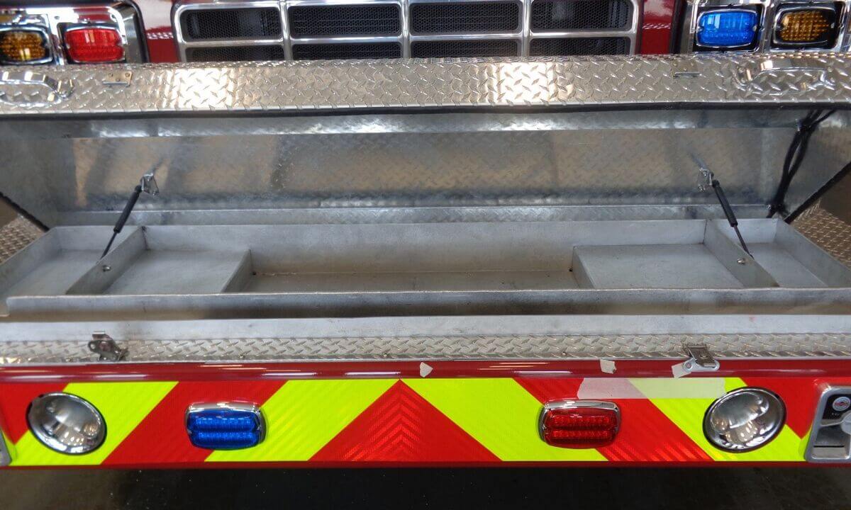 Customizable front bumper compartments